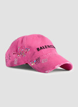 Upcycled cap in pink