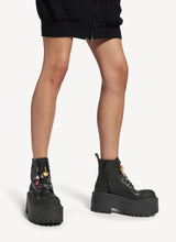 Strike platform bootie with charms