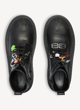 Strike platform bootie with charms